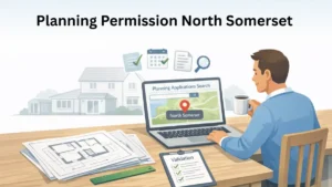 Planning Permission North Somerset illustration showing a UK homeowner reviewing planning applications on a laptop with architectural drawings and validation checklist at a kitchen table.